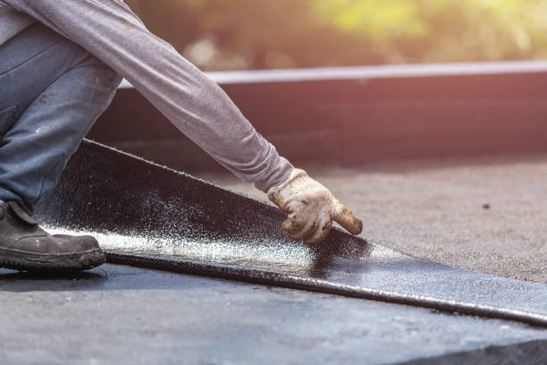 Professional Basement Waterproofing technician working in Louisville, GA